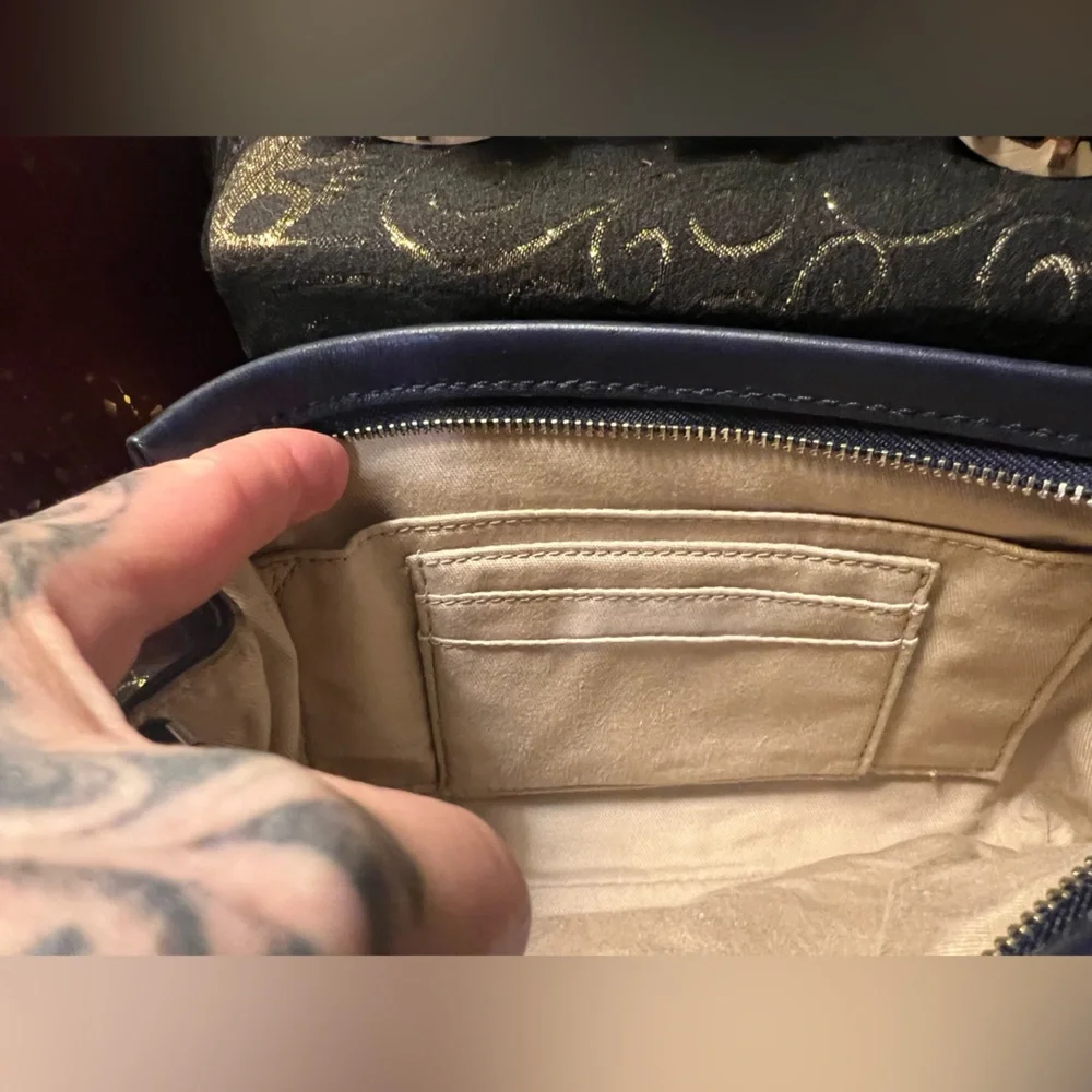 Coach Navy and Light Blue Leather Wristlet with Yellow Accent